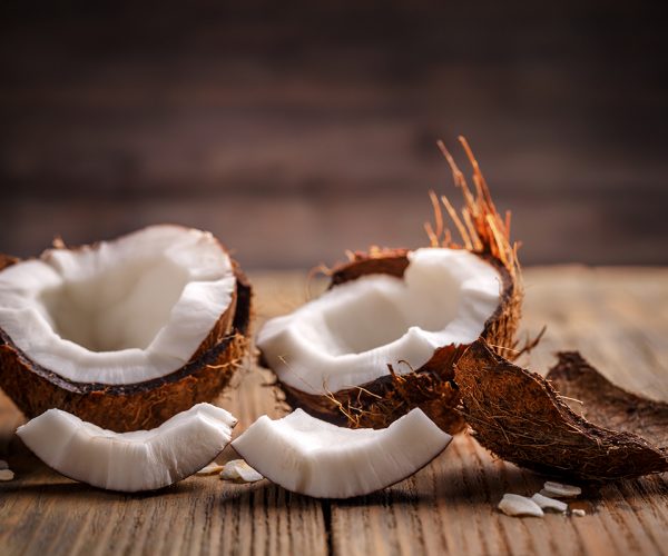 Fruits of coconut on wooden background