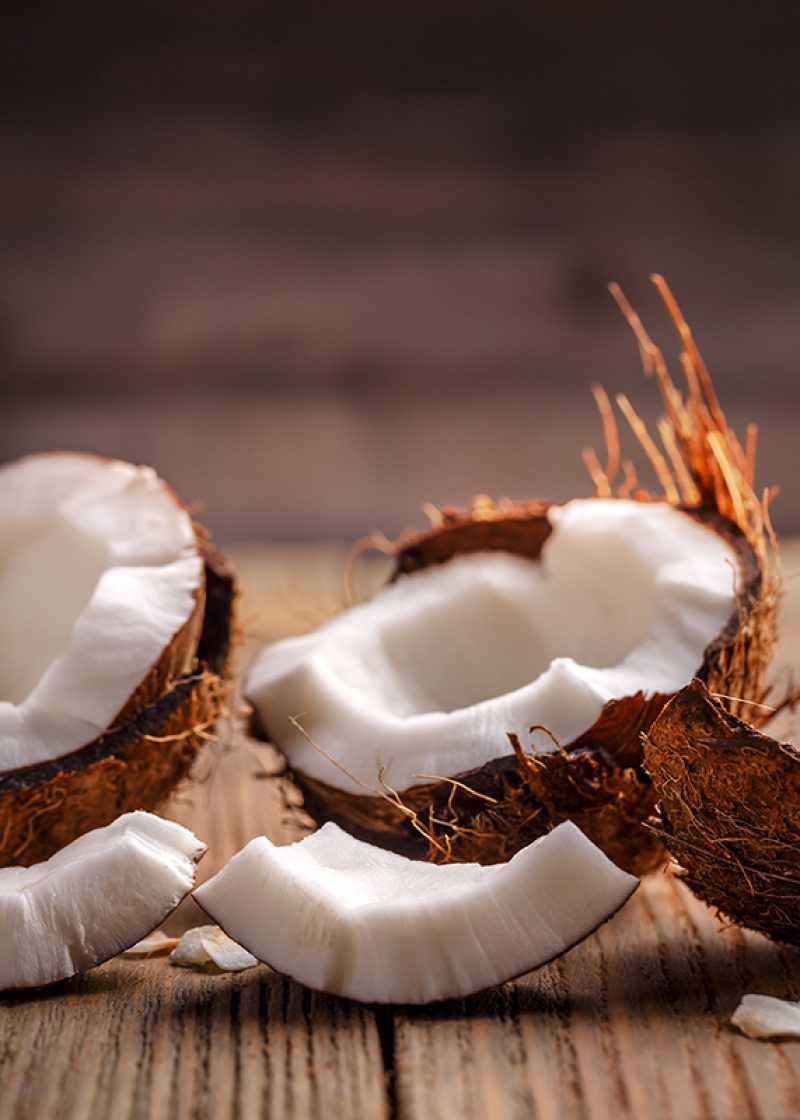 Fruits of coconut on wooden background