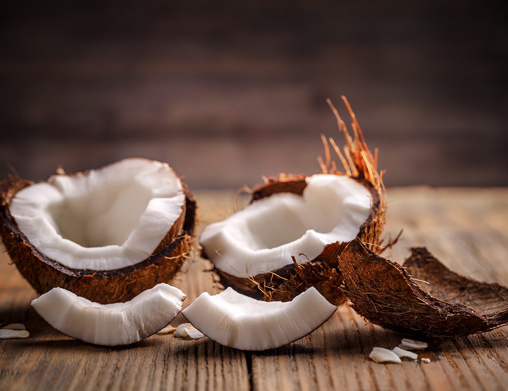 Fruits of coconut on wooden background