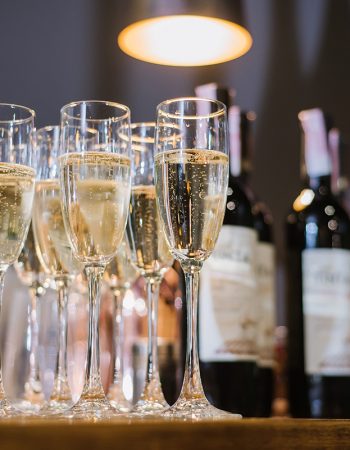 A glasses with champagne on the table at the restaurant. Preparation to celebrate