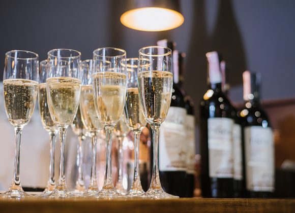 A glasses with champagne on the table at the restaurant. Preparation to celebrate