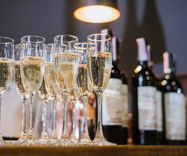 A glasses with champagne on the table at the restaurant. Preparation to celebrate
