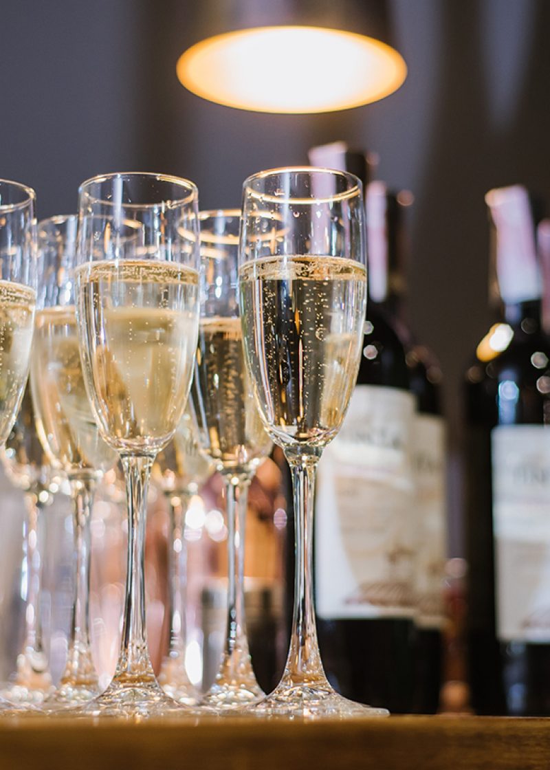 A glasses with champagne on the table at the restaurant. Preparation to celebrate