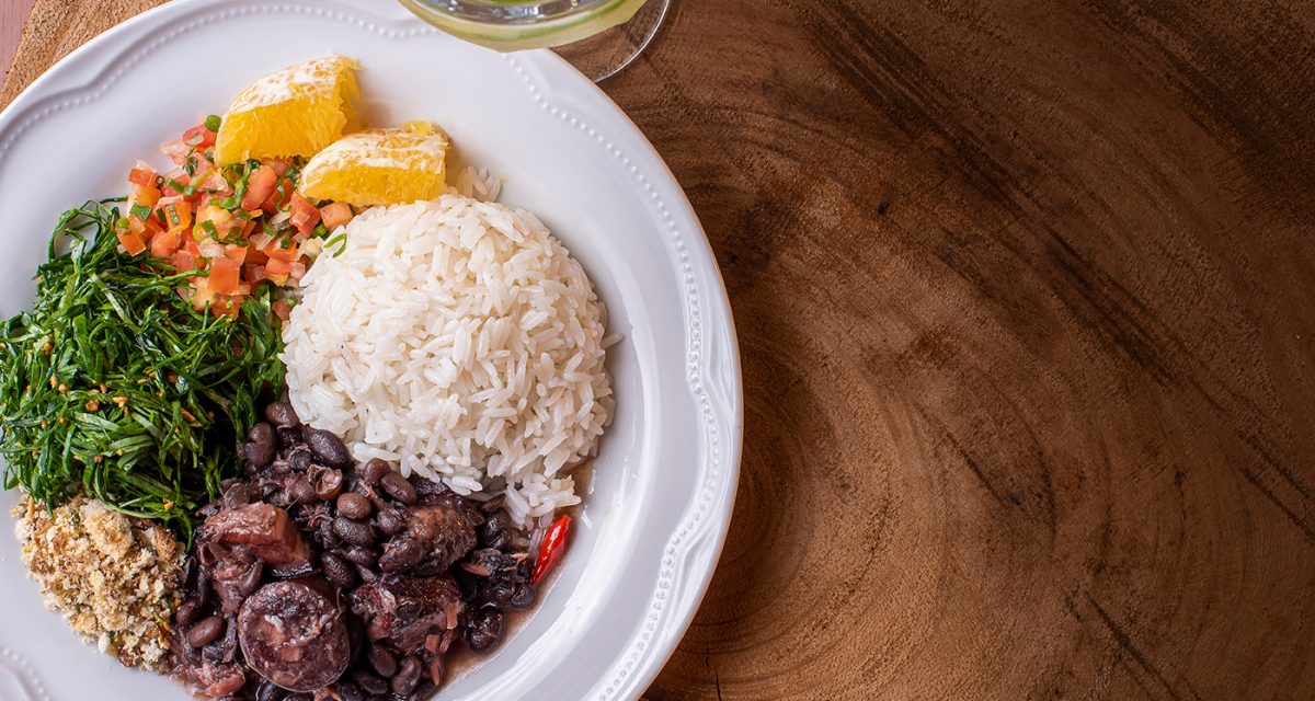 Typical Brazilian dish called Feijoada. Made with black beans, pork and sausage