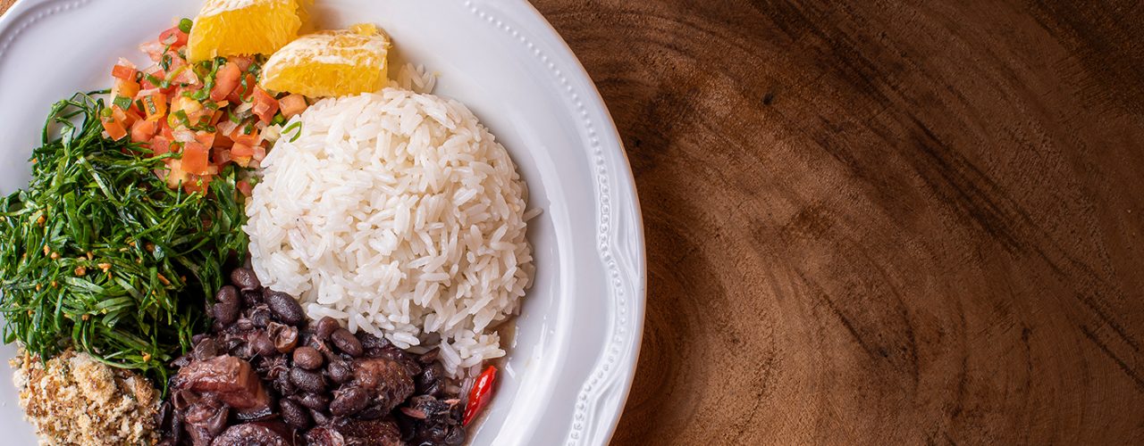 Typical Brazilian dish called Feijoada. Made with black beans, pork and sausage